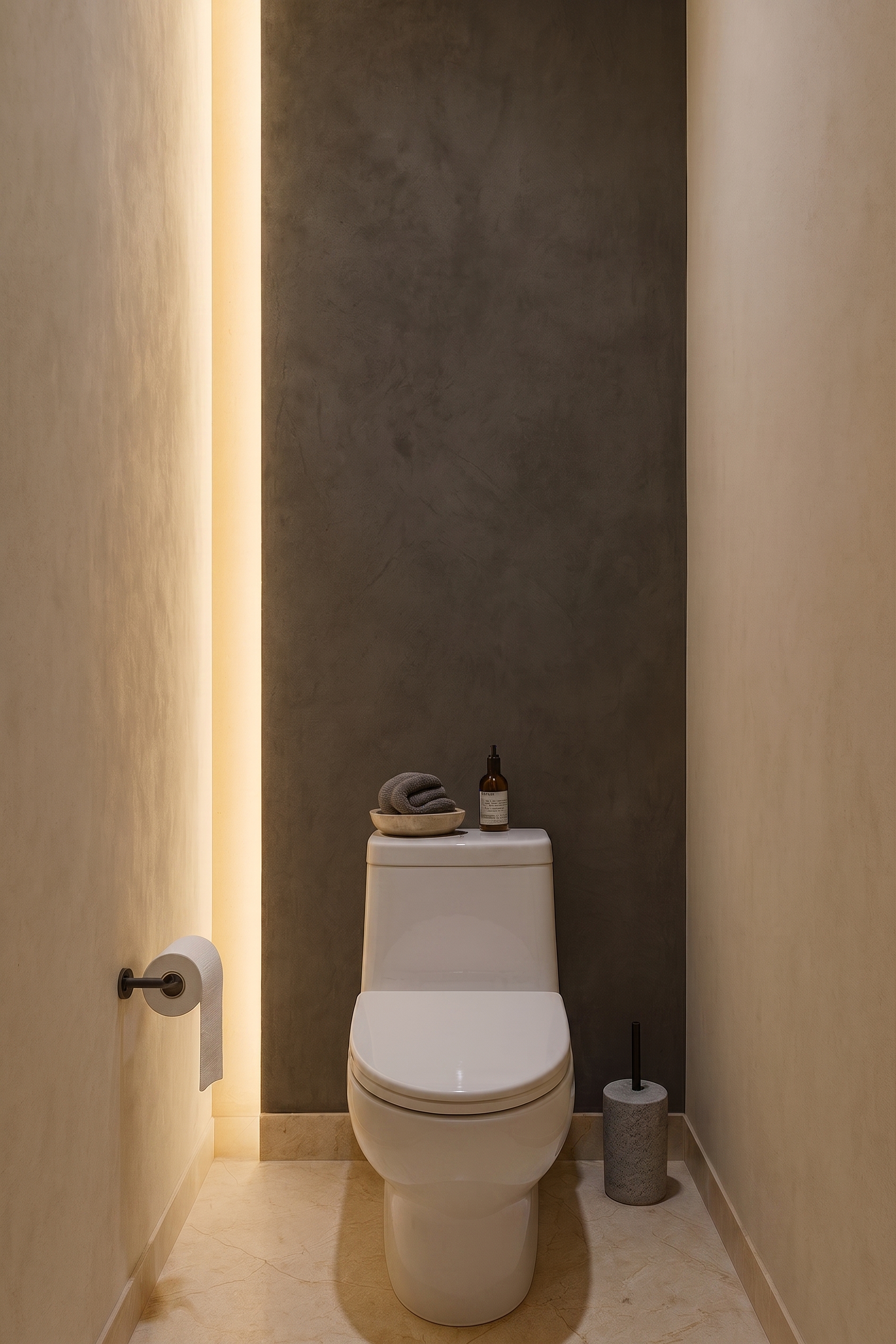 Hansen residence powder room in Texas with indirect lighting and a warm, serene atmosphere